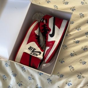 Black, white, and red Nike Air Jordans. Like new.